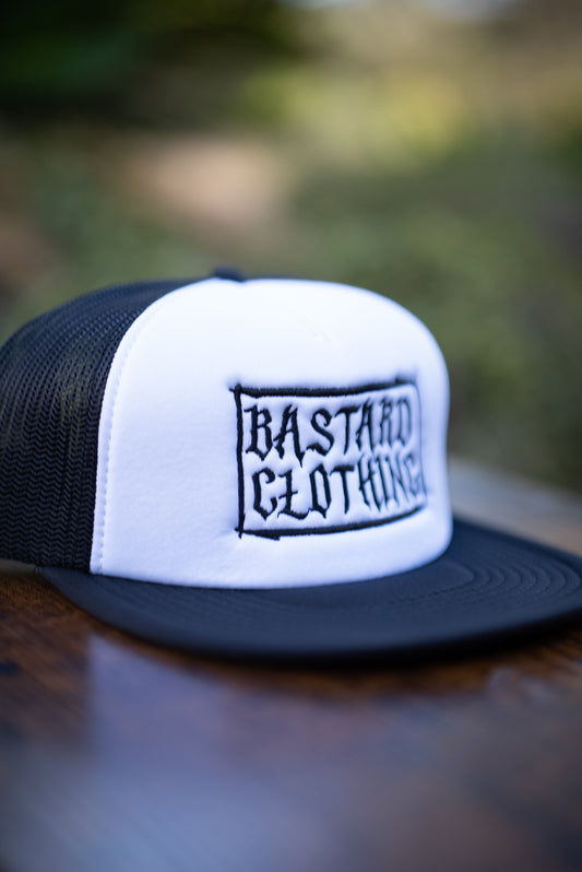 The Outcast Trucker Hat (Flat Bill)