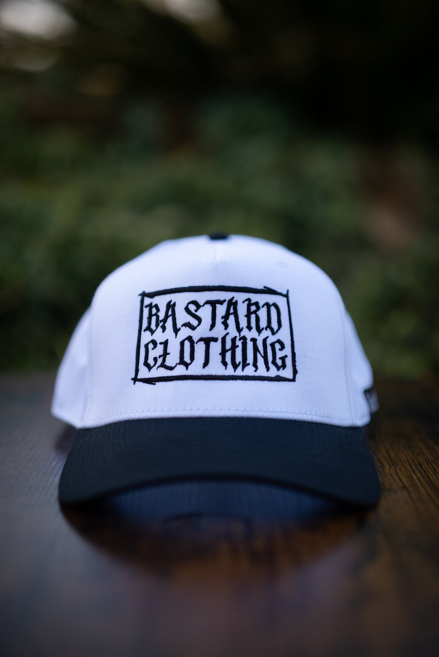 The Outcast White Curved Bill (White w/ Black Stitching)