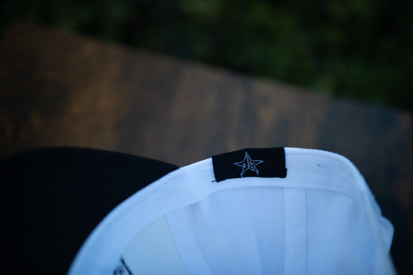The Outcast White Curved Bill (White w/ Black Stitching)