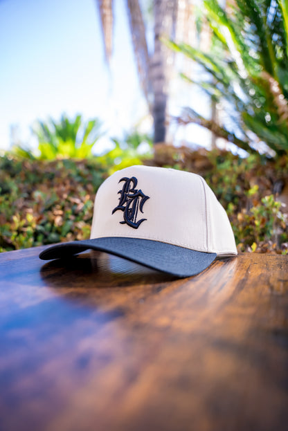 The Jawbreaker (Tan W/ Black Curved Bill)