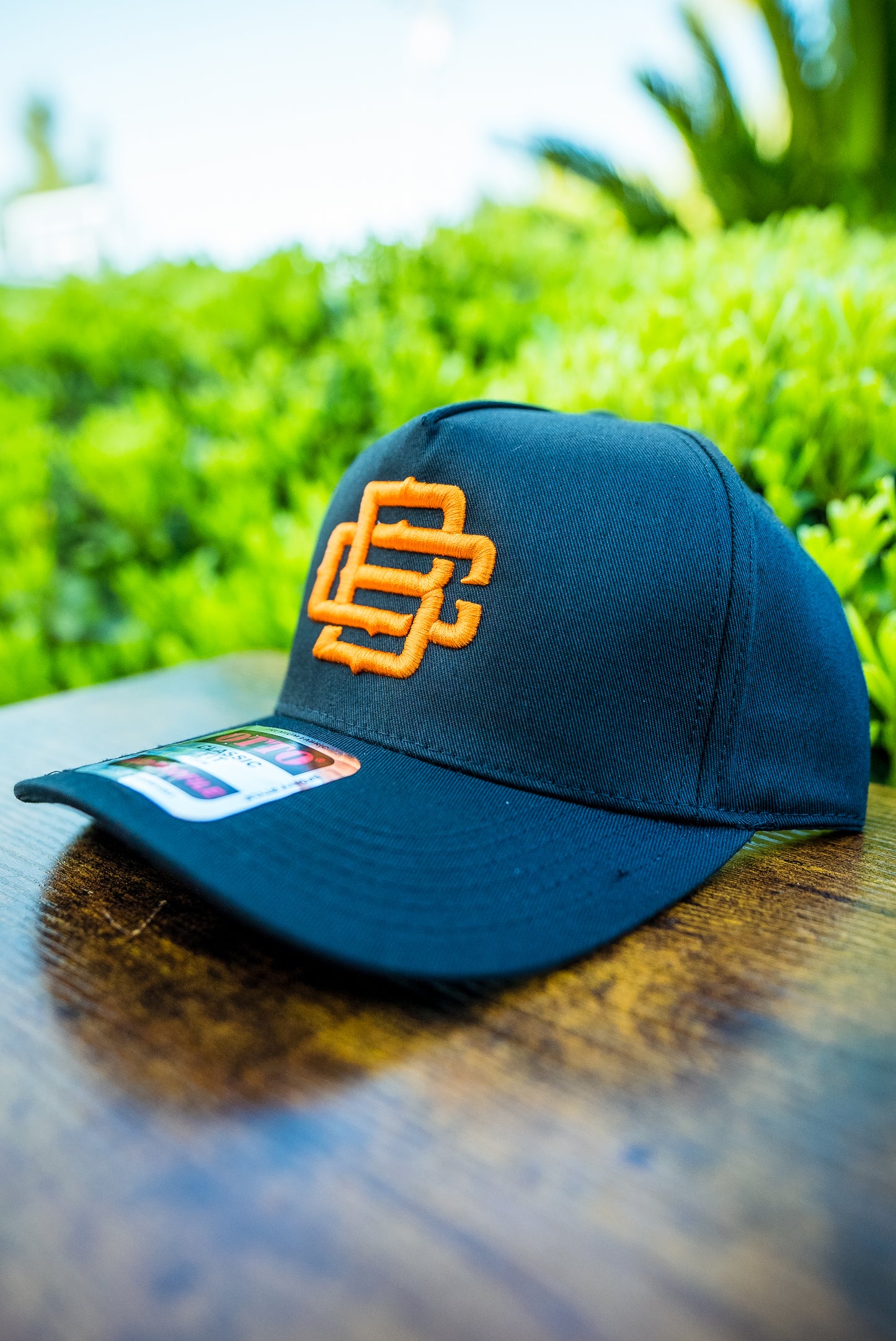 BC Logo Black on Black W/ Orange Stitching (Curved Bill)